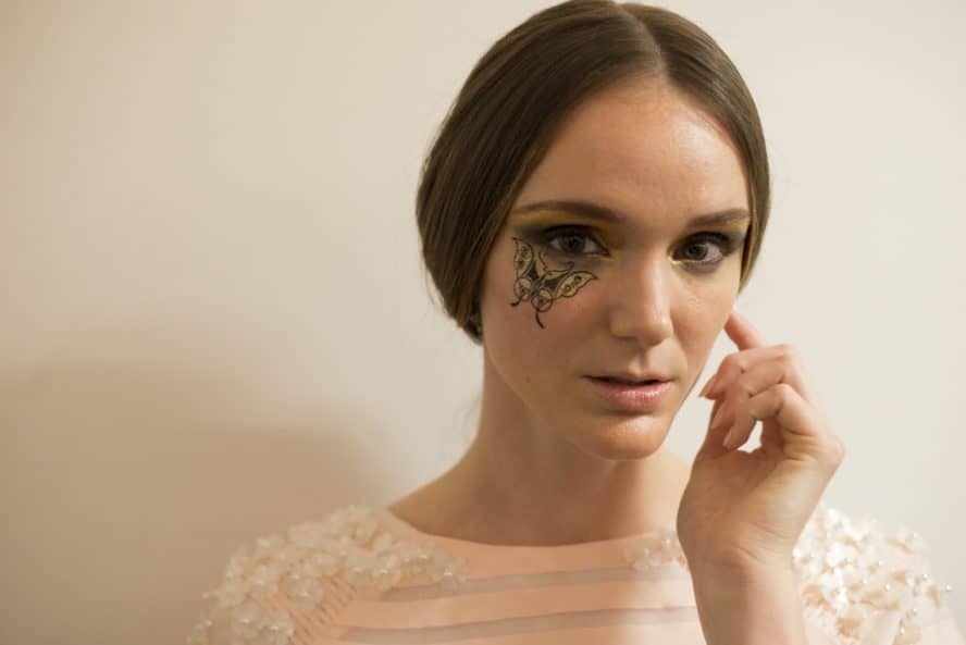 A model in butterfly runway makeup from the Dan Liu NYFW collection